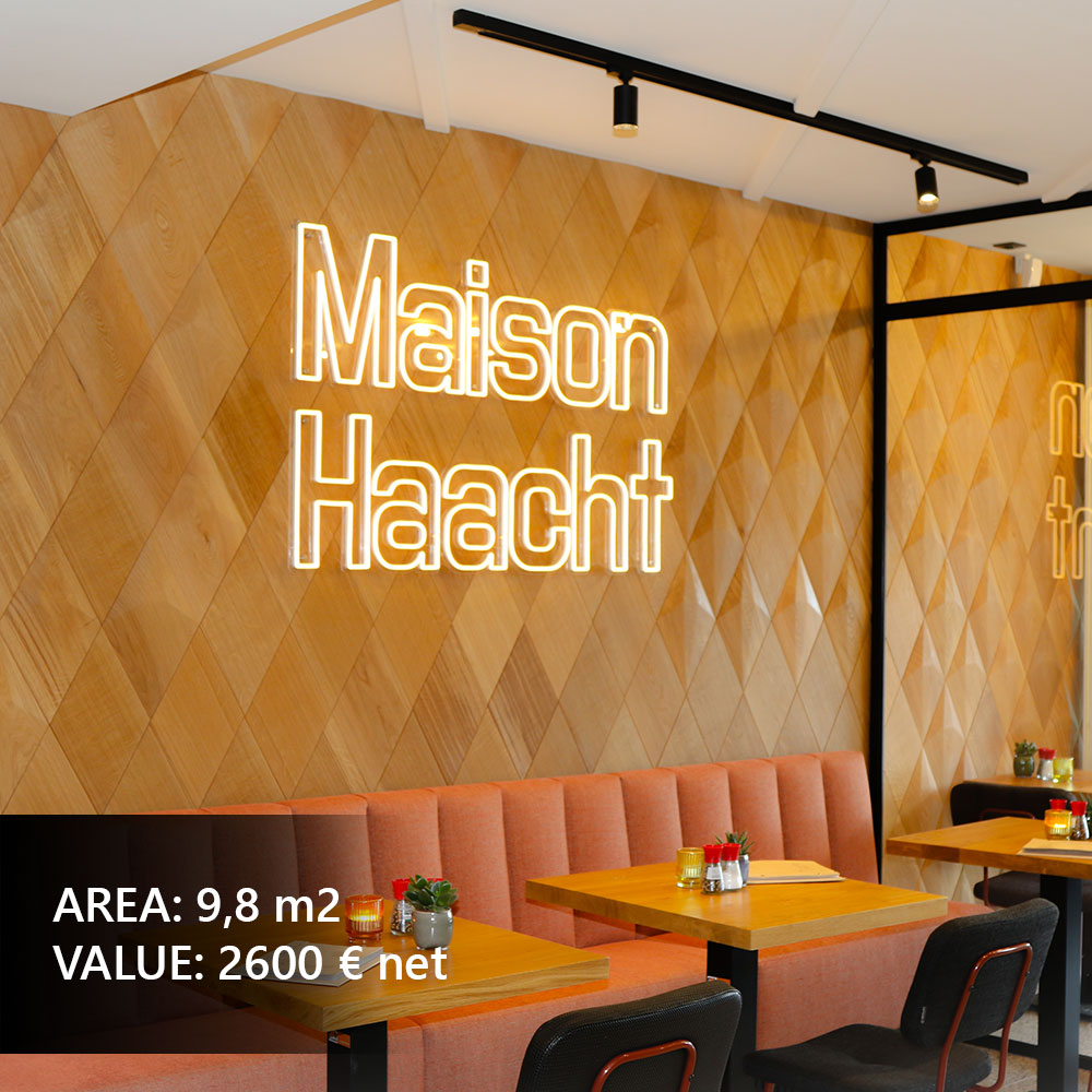 Modern living room fireplace wall decorated with geometric wooden panels.