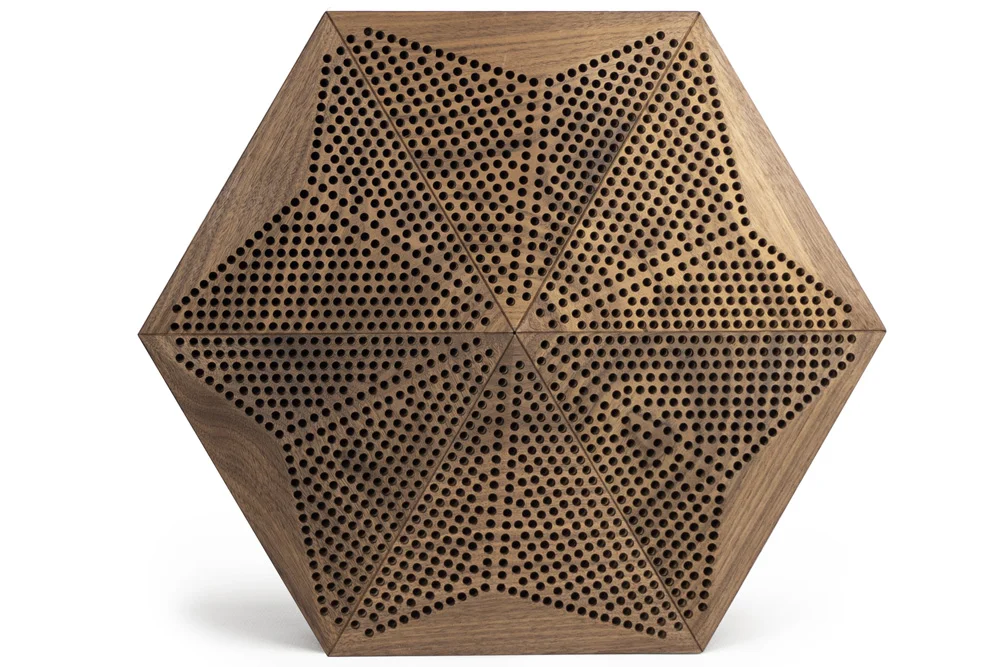 Dark acoustic wood panel with hexagonal shape for sound absorption