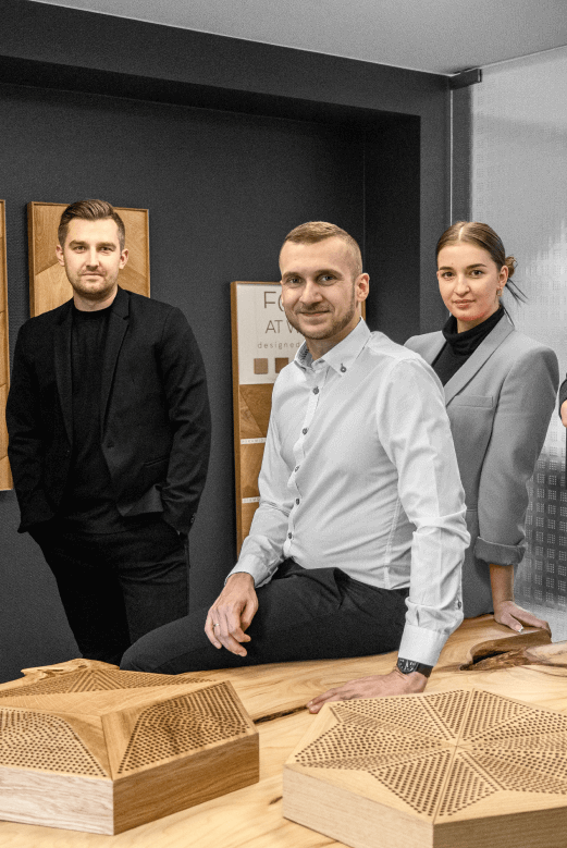 Photo of people with wooden panels