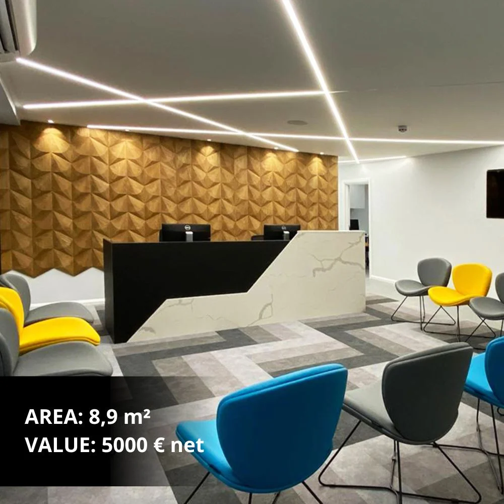 Modern living room with geometric wooden wall panel as a decorative feature behind a dining table.