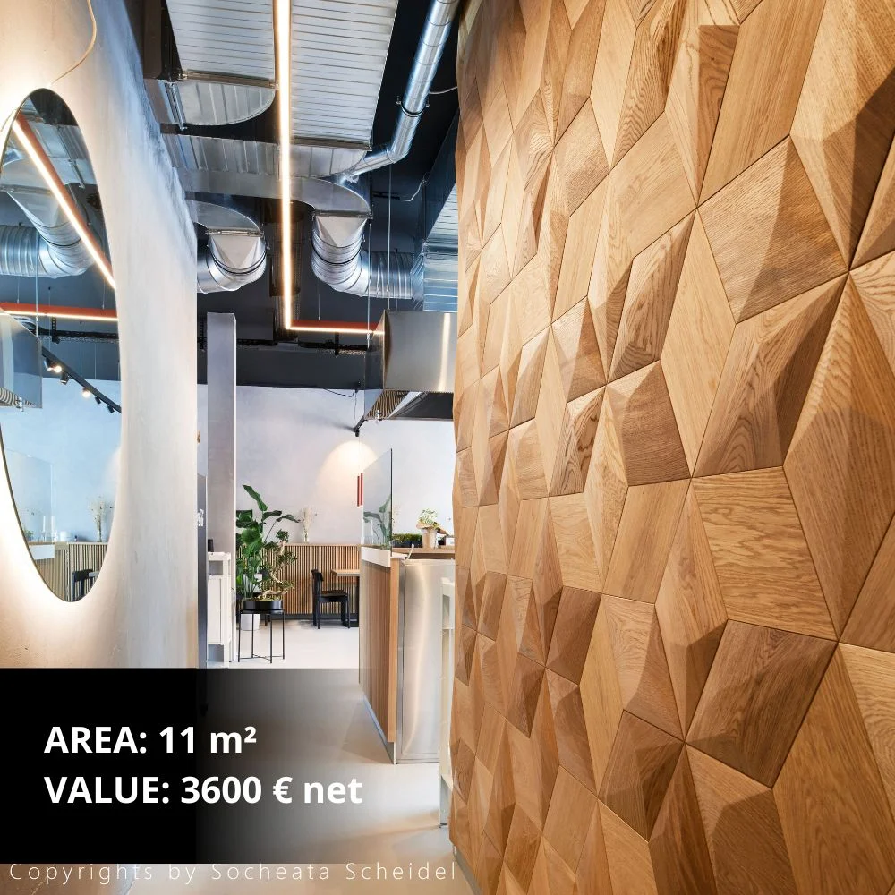 Modern living room with geometric wooden wall panel as a decorative feature behind a dining table.
