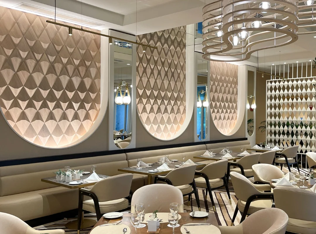 Restaurant interior with repeated pattern of textured wood wall panels