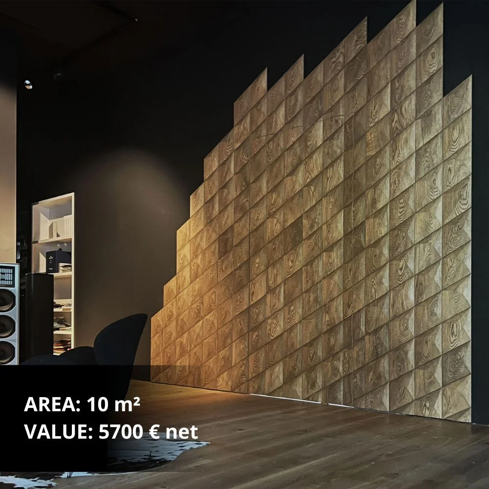 Modern living room with geometric wooden wall panel as a decorative feature behind a dining table.